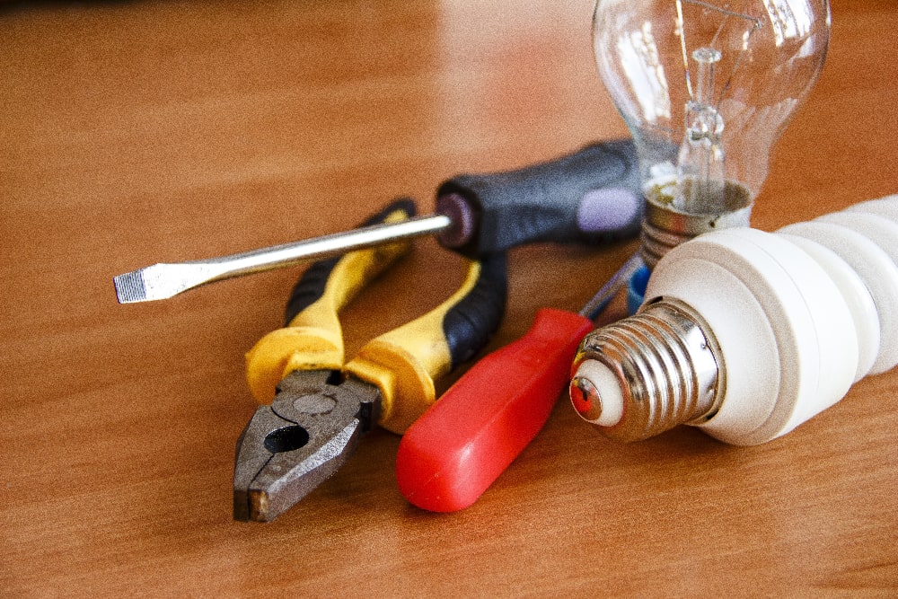 electrican with bulb